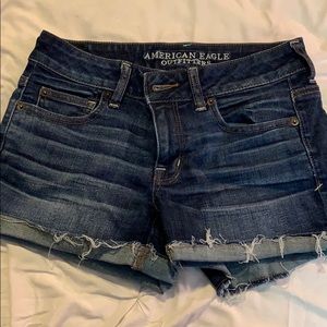 Medium wash AE jean shorts